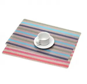 Features recycled rainbow striped PVC rectangular woven table placemats